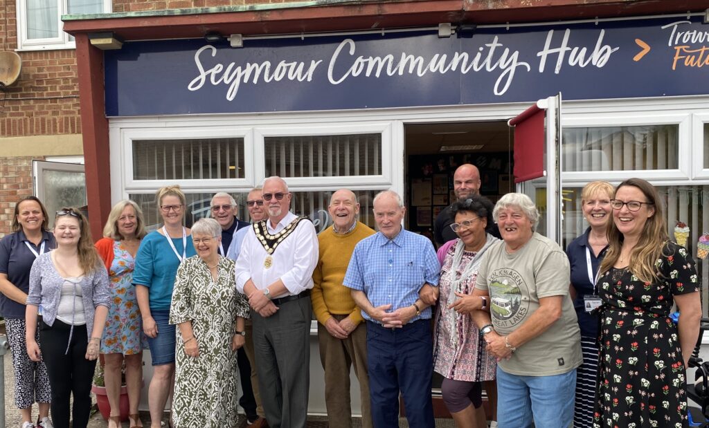 Mayor of trowbridge and locals stood outside the seymour community hub at opening event