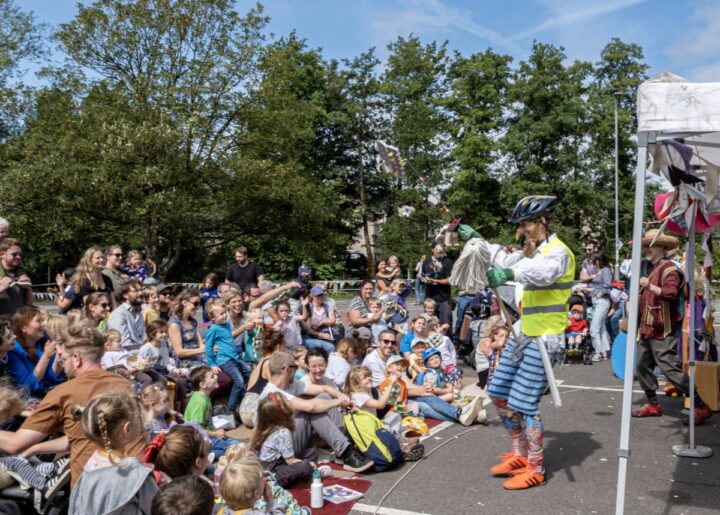 Group picture of children watching a performance at Frome Children's Festival 2023
