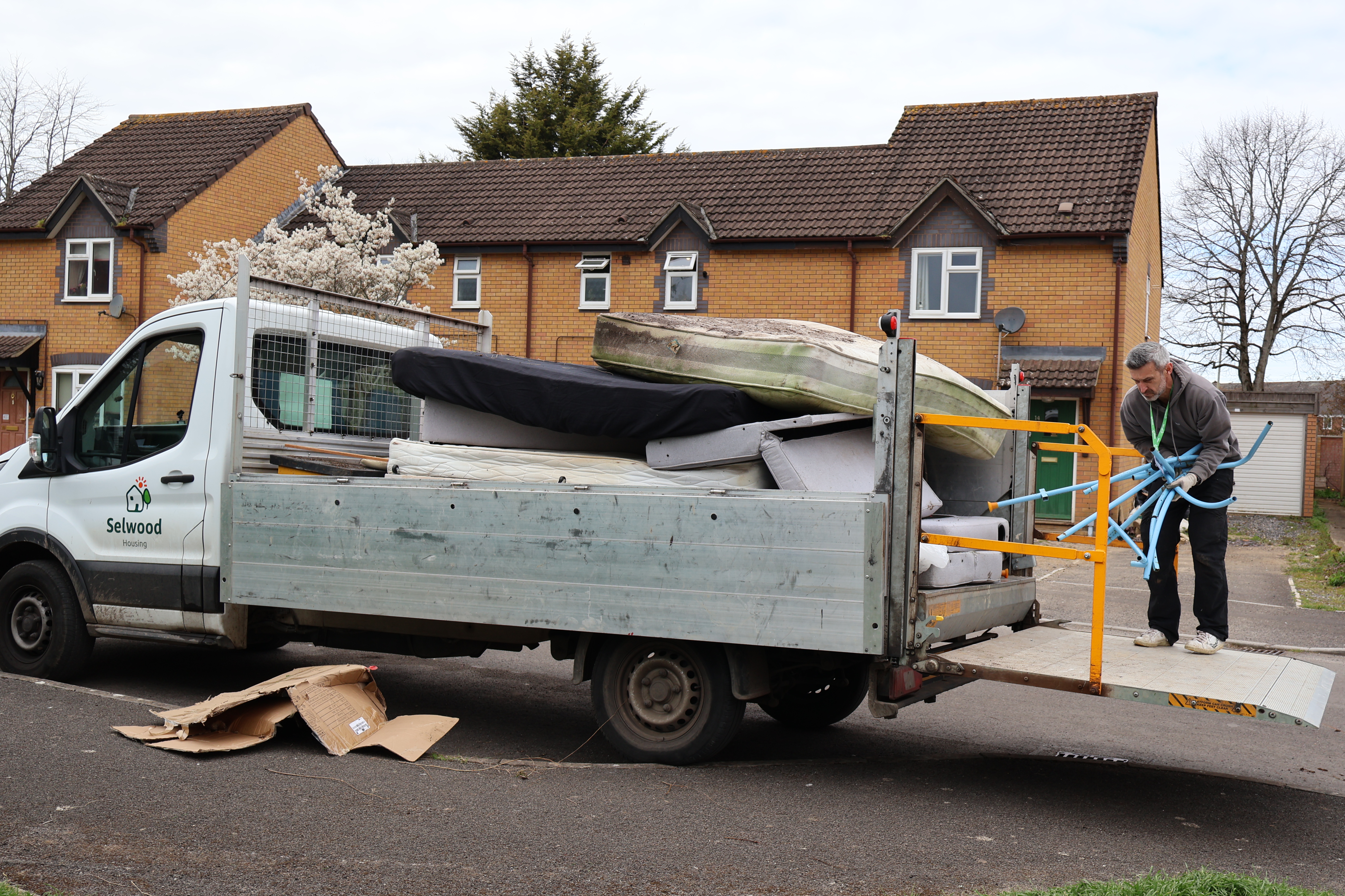 Selwood Housing staff loading unwanted items onto a van during an estate clearance