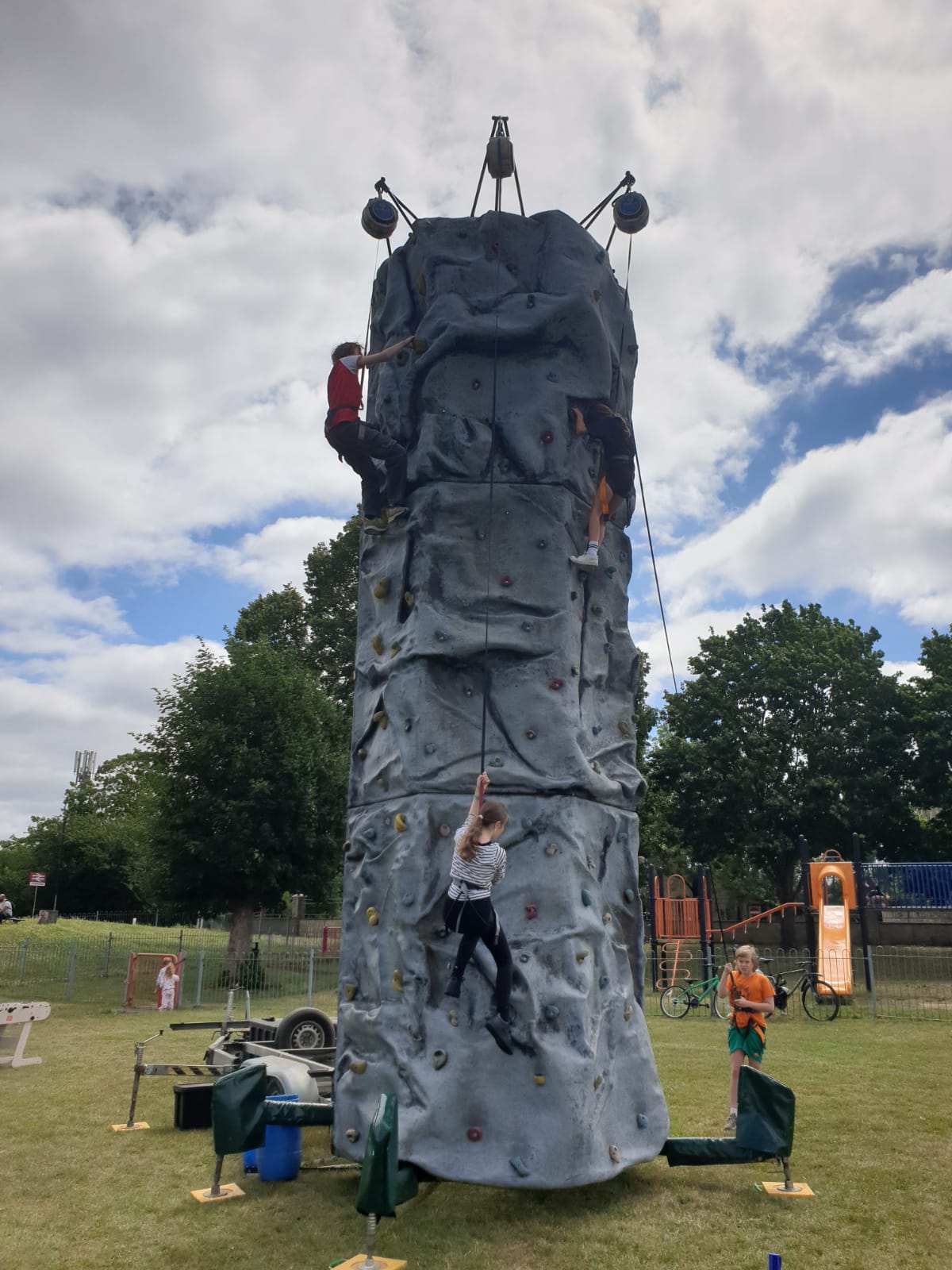 Youth event with climbing wall in the park
